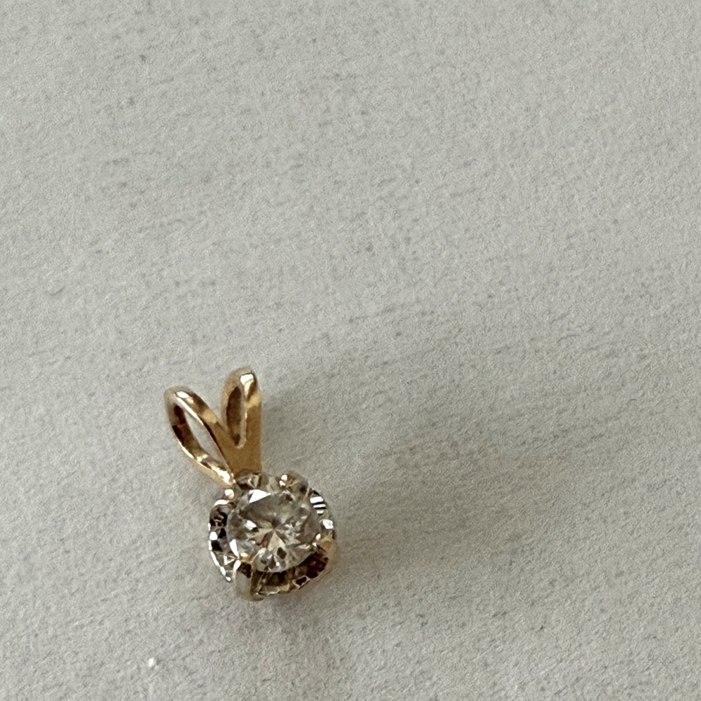 Gold and diamond pendant
